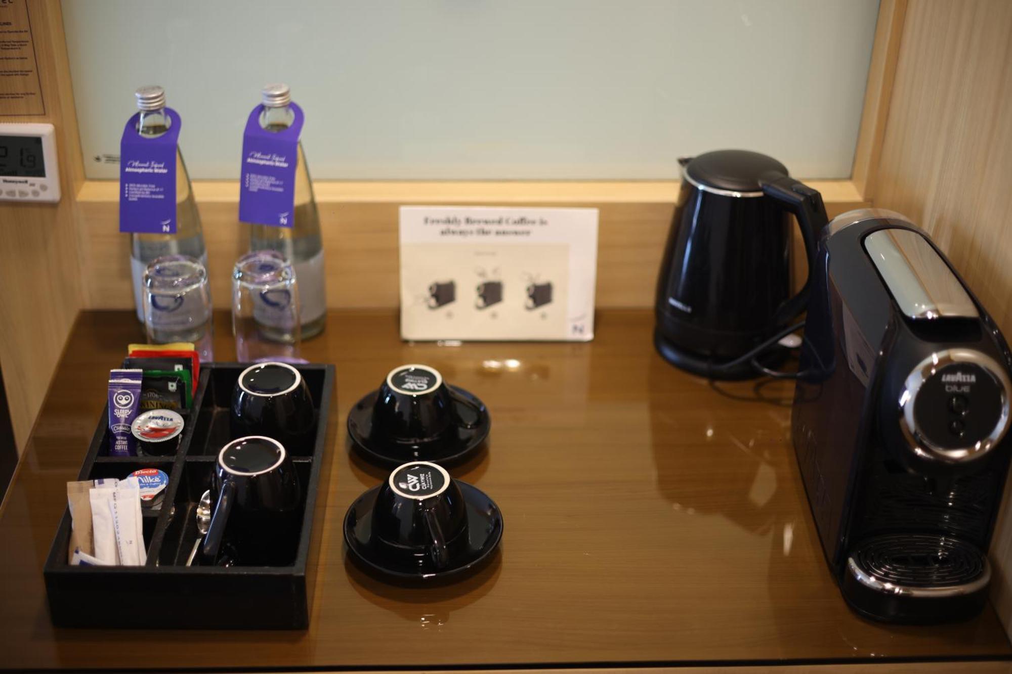 Novotel Hyderabad Airport Екстер'єр фото A Nespresso machine in a hotel room